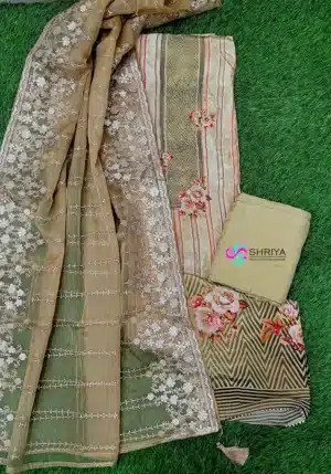 Digital muslin silk top paired with a embroidered organza dupatta and cotton silk bottom