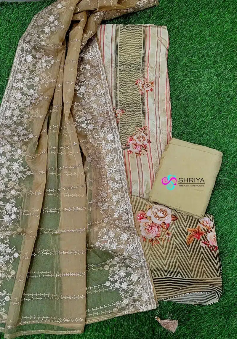 Digital muslin silk top paired with a embroidered organza dupatta and cotton silk bottom