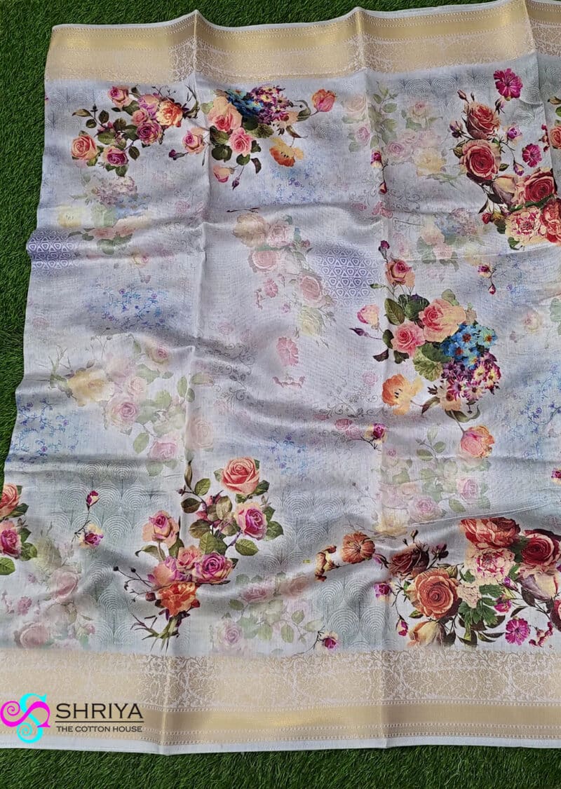 Beautiful Pastel shades of Pure Linen Cotton Saree with a trendy floral prints, Zari border and a floral printed blouse - Image 2