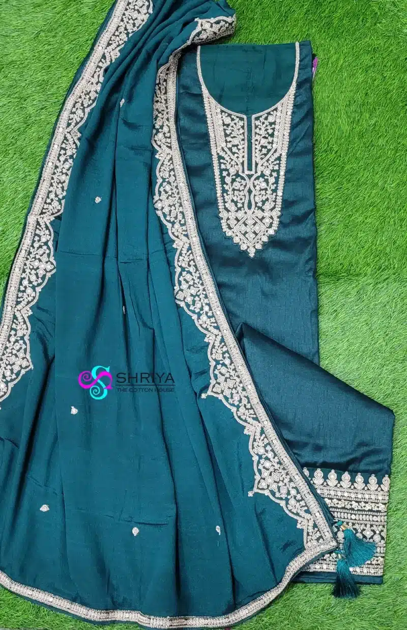 Soft dola silk top paired with a embroidered pure georgette dupatta and cotton silk bottom