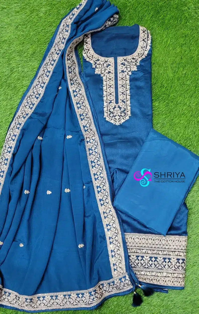 Soft dola silk top paired with a embroidered pure georgette dupatta and cotton silk bottom