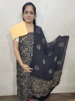 Batik dyed embroidered crepe georgette top paired with a printed embroidered georgette dupatta and contrast bottom