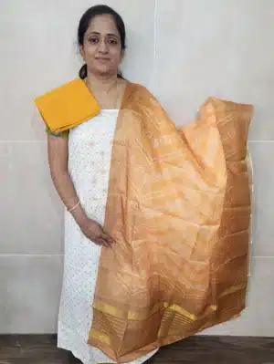 Printed premium cotton top paired with a printed Kota silk dupatta and cotton bottom