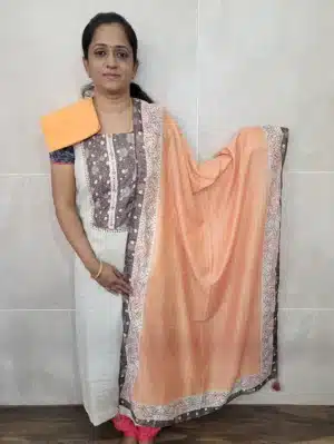 Pure muslin silk top paired with a printed muslin silk dupatta and cotton bottom