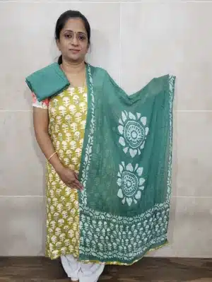 Batik dyed Rayon top with kantha stitches paired with batik dyed georgette dupatta and cotton bottom