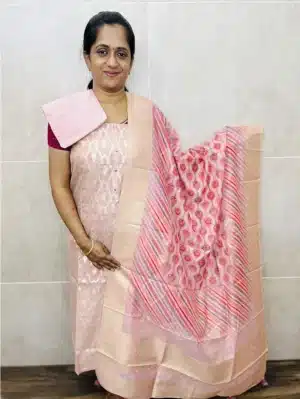 Zari weaved Chanderi silk top paired with a digital printed and zari weaved Benaras silk dupatta and cotton silk bottom