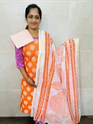 (Orange) Printed cottton top paired with a printed cotton dupatta and cotton bottom
