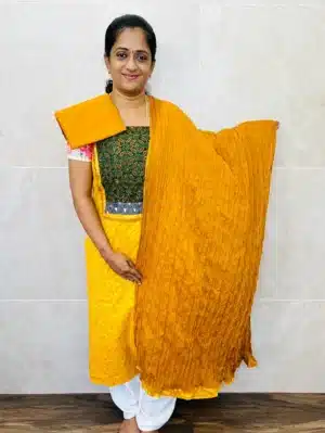 Handblock printed Mangalagiri cotton top with ajrakh patchwork on yoke paired with crush cotton dupatta and cotton bottom
