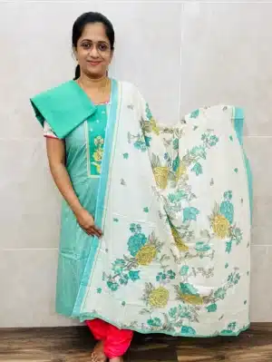 Printed cotton top with patchwork on yoke paired with a printed cotton dupatta and cotton bottom