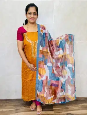Embroidered organza top paired with a printed organza dupatta and silk bottom (lining included)