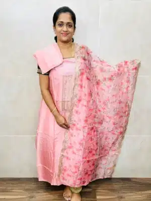 Pure dola silk top with simple embroidered yoke paired with printed pure organza dupatta and cotton silk bottom