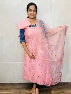 Soft Chanderi silk top with allover embroidery paired with embroidered organza dupatta and cotton silk bottom