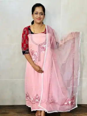 Pure organza top with embroidered patchwork paired with organza dupatta and cotton silk bottom