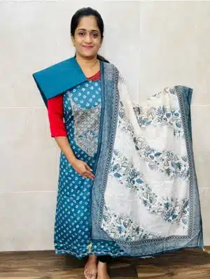 Printed Rayon top with embroidered yoke paired with printed soft cotton dupatta and cotton bottom