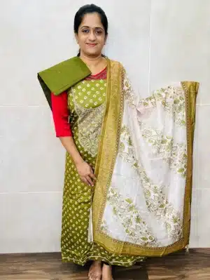 Printed Rayon top with embroidered yoke paired with printed soft cotton dupatta and cotton bottom