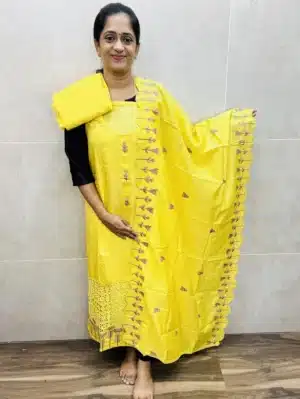 Soft silk top with lace cutwork paired with embroidered soft silk dupatta and cotton silk bottom