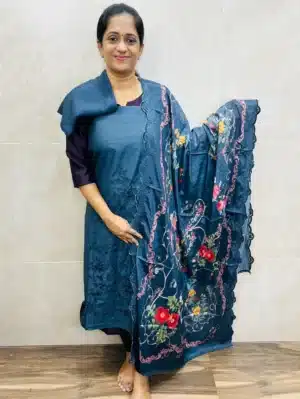 Pure muslin silk top with cutwork paired with muslin silk dupatta and santoon bottom 