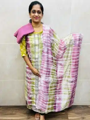 Soft muslin silk top with allover crochet lace and 3d floral work paired with muslin silk dupatta and silk bottom