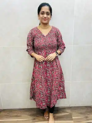 Pink - Kalamkari printed pure cotton top with Smokey work on yoke and sleeves (Aline pattern)