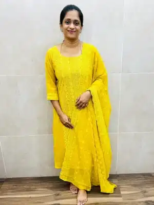 Yellow - Georgette top (full crepe lining) with allover Chikankari embroidery paired with embroidered Georgette dupatta and silk bottom (straight cut)