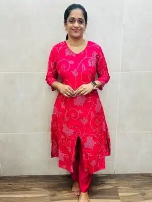 Rani Pink - Printed premium muslin silk top (cotton lining) with potli work in yoke paired with muslin silk bottom (Flared Aline pattern)