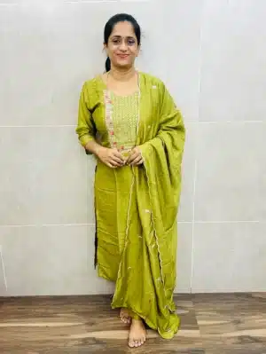 Parrot green - Soft silk top(crepe lining) with exclusive embroidery on yoke and dupatta paired with soft silk bottom (straight cut)
