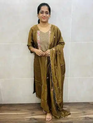 Brown - Soft silk top(crepe lining) with exclusive embroidery on yoke and dupatta paired with soft silk bottom (straight cut)