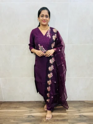 Muslin silk top(crepe lining) with embroidered yoke paired with designer organza dupatta and silk bottom