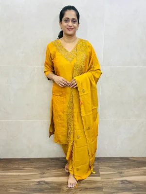 Premium soft silk top with full crepe lining, featuring intricate embroidery and handwork on the yoke. Paired with an embroidered soft silk dupatta and matching silk bottom. (Free size)