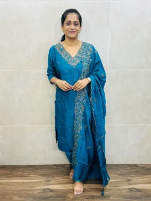 Premium soft silk top with full crepe lining, featuring intricate embroidery and handwork on the yoke. Paired with an embroidered soft silk dupatta and matching silk bottom. (Free size)