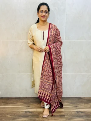 Soft silk top(cotton lining) with contrast potli work on yoke paired with printed semi modal dupatta and silk bottom(free size)